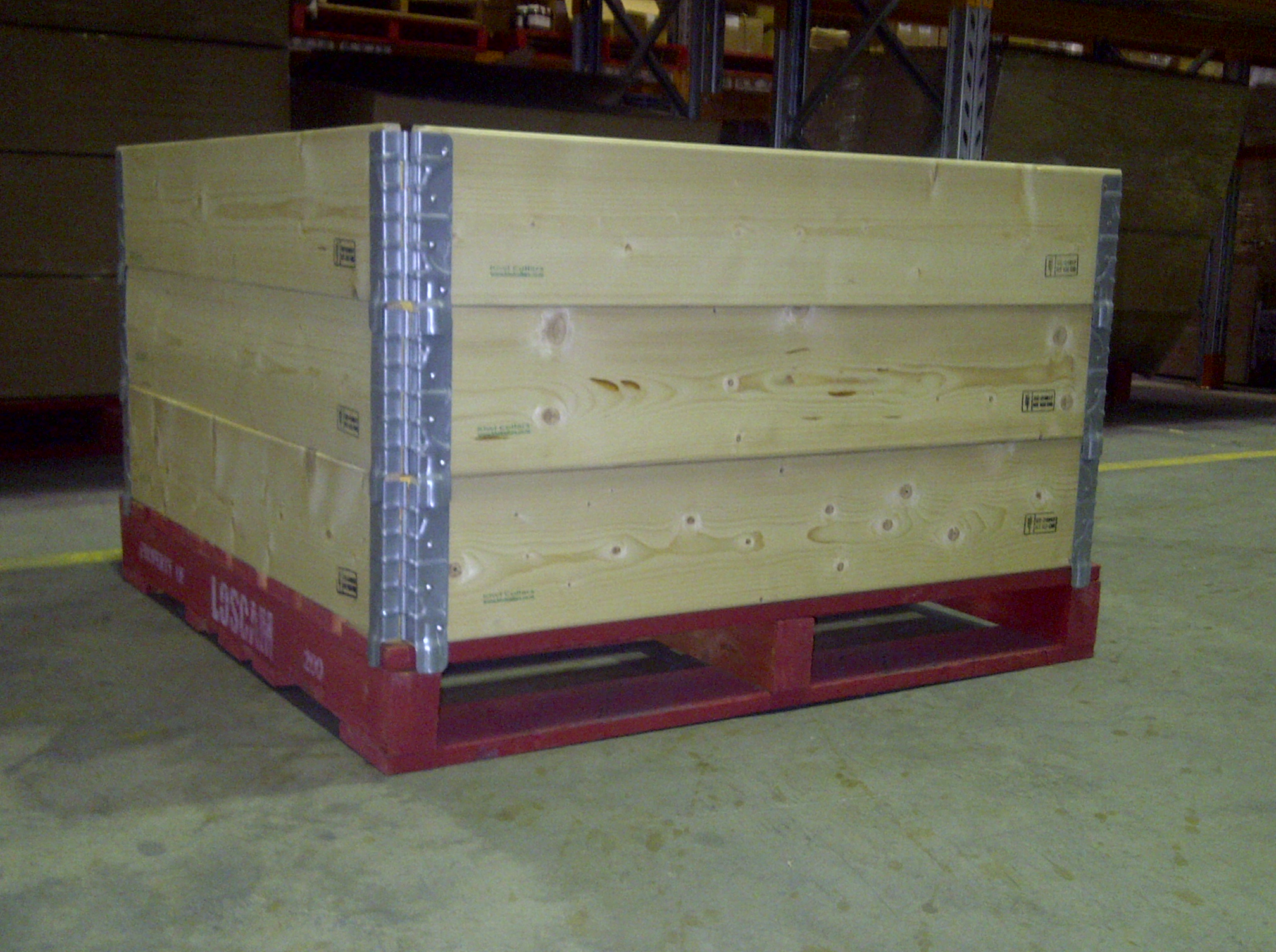 3 pallet collars on a shipping pallet.